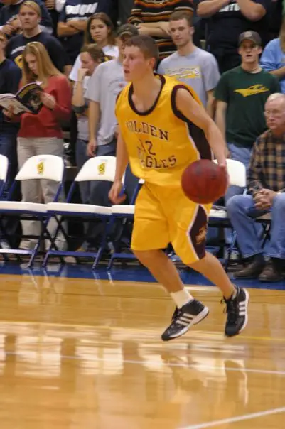 John Willkom playing basketball at Minnesota Crookston