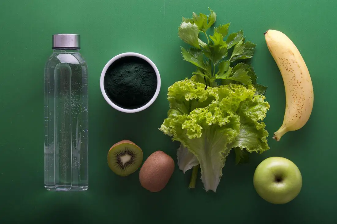 photo of health, nutritious foods including lettuce, banana, apple, kiwi, and water